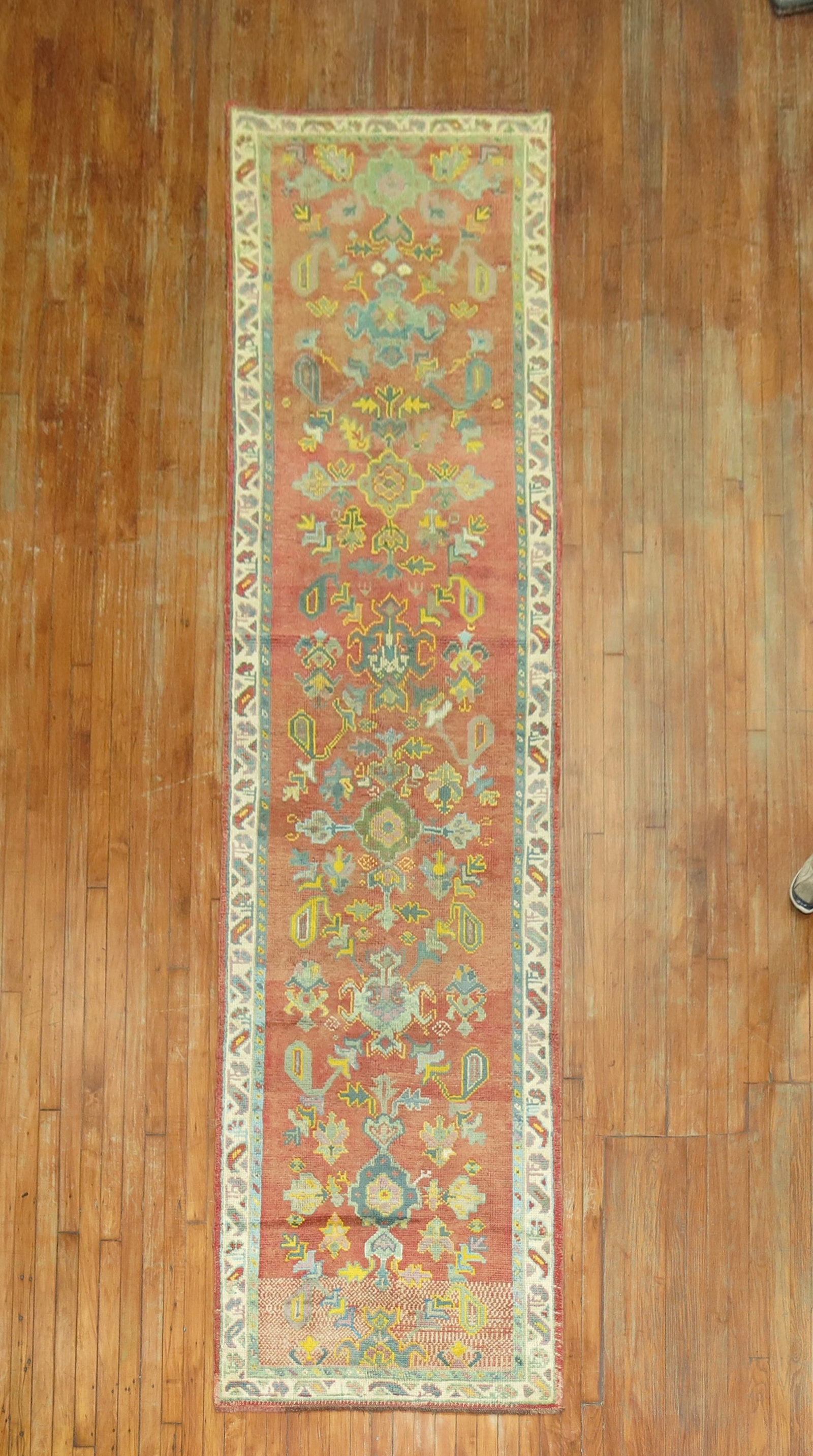 3' 2" x 12' 10" Turkish Oushak runner in orange coral: 3' 2" x 12' 10" Turkish Oushak runner in orange coral Early 20th century antique Turkish Oushak runner with an orange coral palette and decorative patterned design. This pre-owned rug is identified as