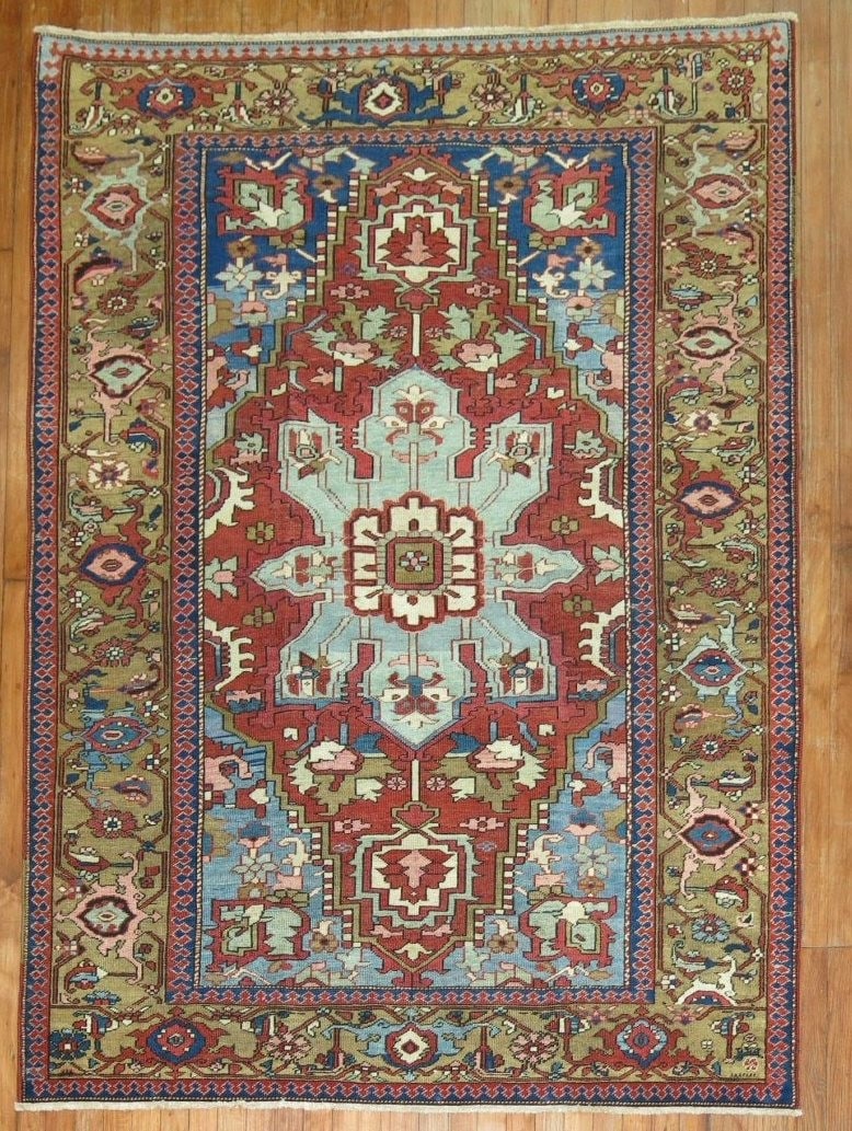5' 2" x 6' 10" Persian Serapi Heriz Accent Rug: 5' 2" x 6' 10" Persian Serapi Heriz Accent Rug Antique Persian Serapi rug from the 1900s with a classic medallion design and intricate patterned field. This pre-owned accent rug is identified as a Ser