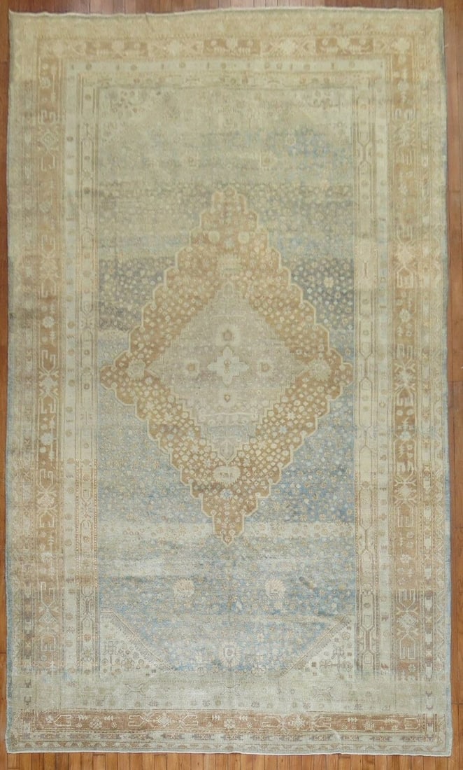 7' x 13' 5" Early 20th Century Khotan Gallery Rug: 7' x 13' 5" Early 20th Century Khotan Gallery Rug Early 20th-century Khotan gallery rug in blue and caramel tones. This pre-owned rug features the elongated gallery format associated with Khotan weavi