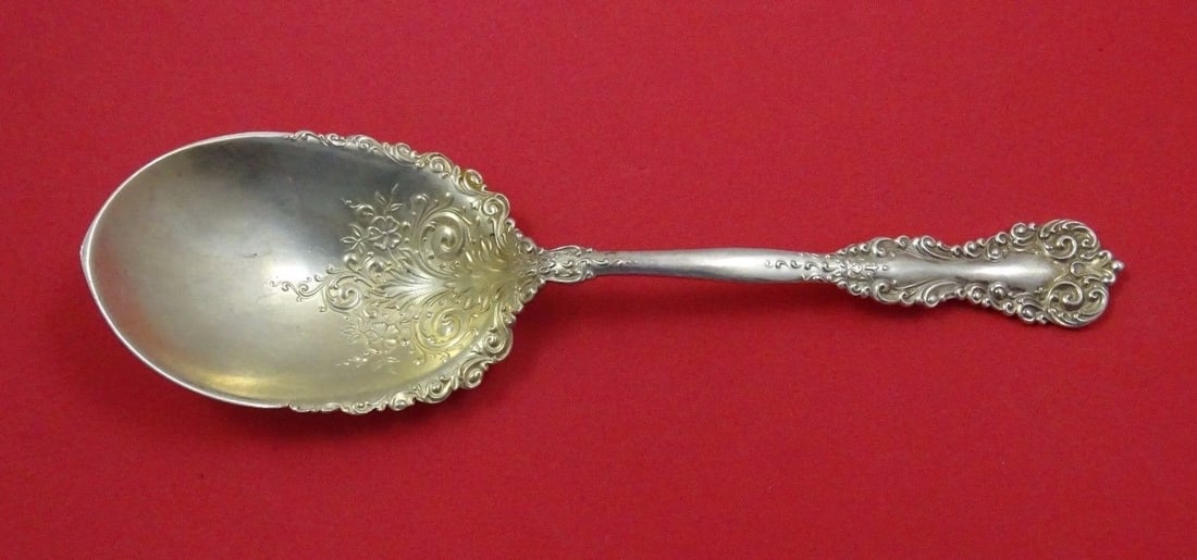 International Revere Sterling Silver Berry Spoon Gold Washed 8.5": International Revere Sterling Silver Berry Spoon Gold Washed 8.5" This exquisite Revere Berry Spoon is crafted from high-quality sterling silver and features a stunning gold-washed fancy bowl. Measuri