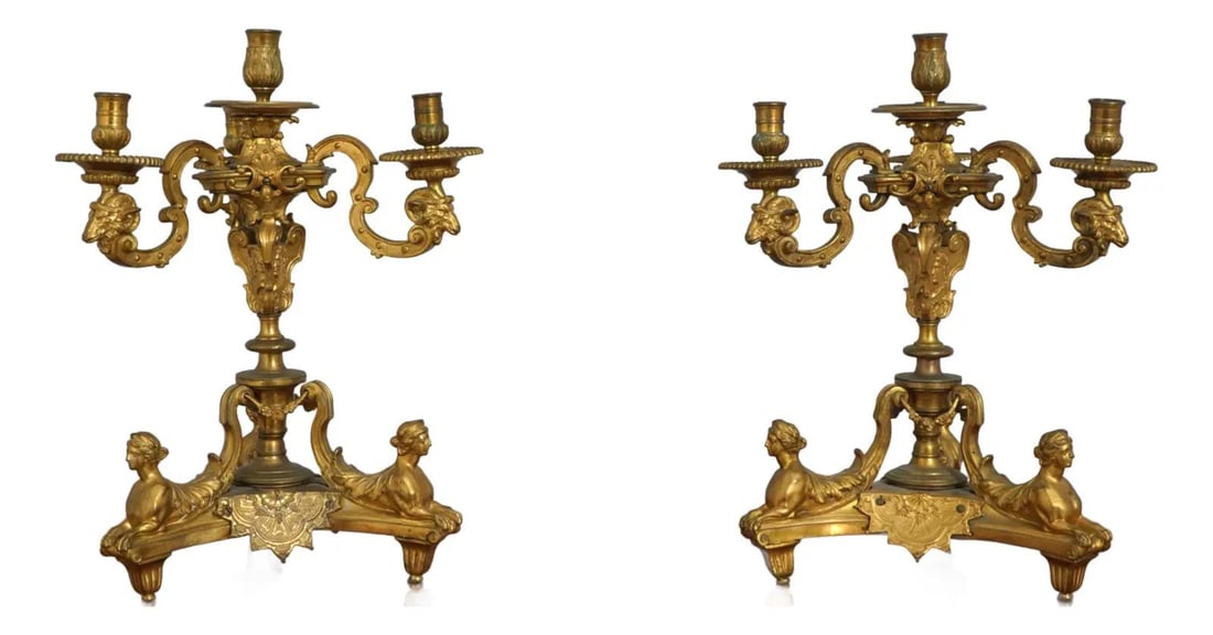 Elegant Pair of Mid 19th Century Bronze Candelabras in Gold Finish: Elegant Pair of Mid 19th Century Bronze Candelabras in Gold Finish This exquisite pair of candelabras showcases the elegance of the Mid 19th Century, reflecting the Italian Louis XIV and French Regenc