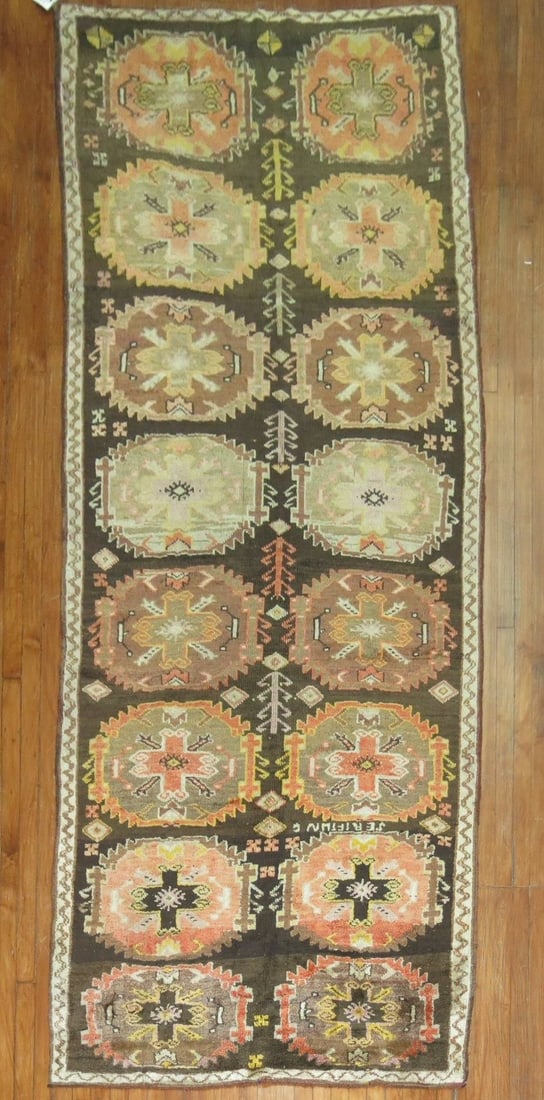 4' 5" x 12' 4" Vintage Kars Gallery Rug: 4' 5" x 12' 4" Vintage Kars Gallery Rug Vintage Anatolian Kars gallery rug from the mid 20th century. This pre-owned carpet features a long rectangular form and a geometric design characteristic of Ka