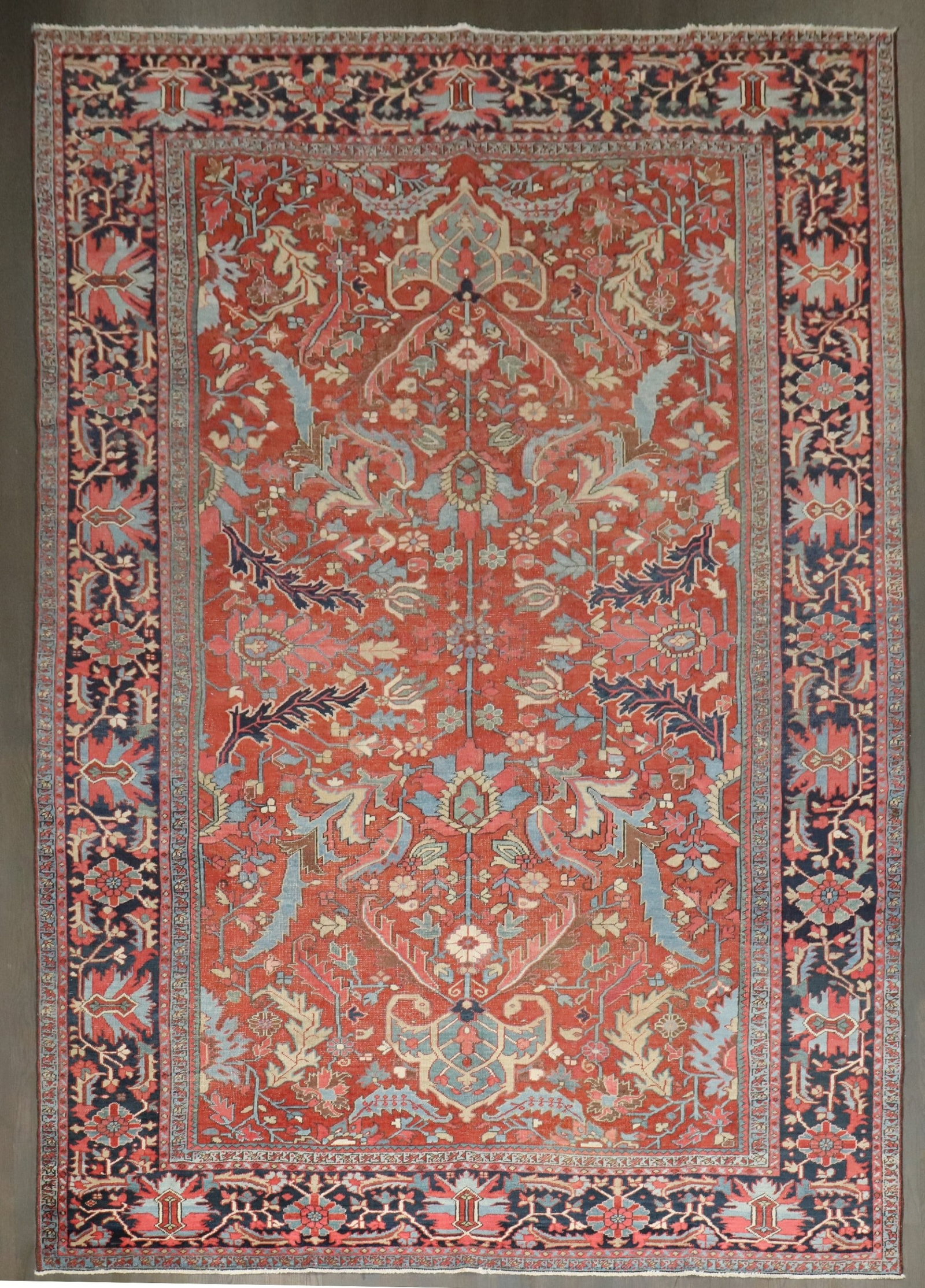 8' 6" x 12' 2" Persian Serapi Heriz Room Rug: 8' 6" x 12' 2" Persian Serapi Heriz Room Rug Early 20th century Persian Heriz rug with a Serapi/Heriz design. This pre-owned room-size rug features a red field with intricate floral and geometric moti