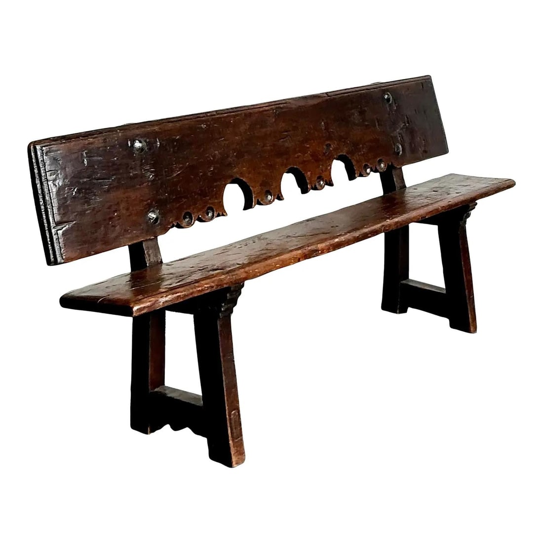 Spanish Colonial Oak Plank Bench 74.75 x 31.75: Spanish Colonial Oak Plank Bench 74.75 x 31.75 This 18th-century plank bench is a remarkable example of Spanish Colonial craftsmanship, entirely hand-carved from solid oak. It features a distinctive s