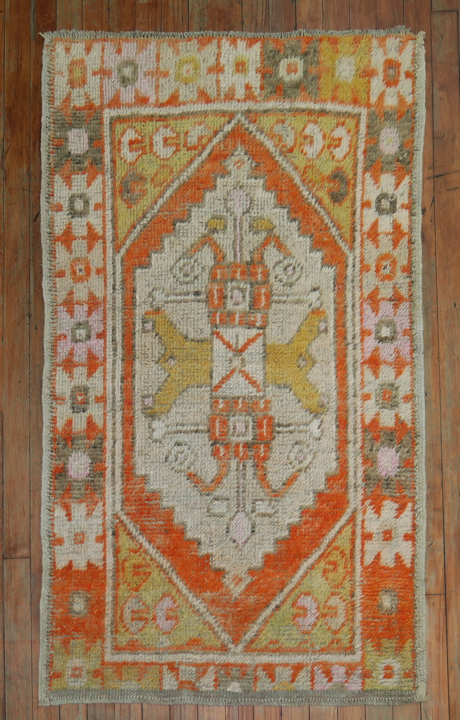 2' 8" x 4' 4" Turkish Anatolian Small Scatter Rug Orange: 2' 8" x 4' 4" Turkish Anatolian Small Scatter Rug Orange Pre-owned Turkish Anatolian scatter rug in a bright orange palette with a central geometric pattern and detailed border design. Specifications 