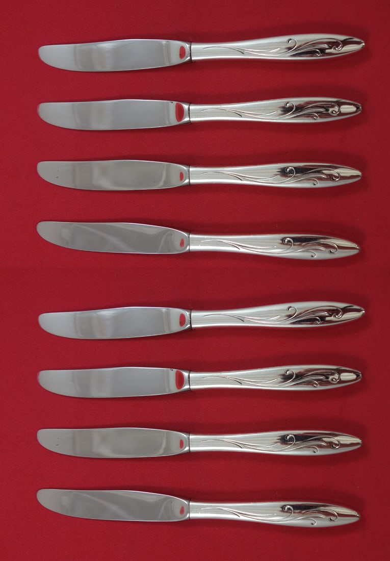 Towle Awakening sterling silver butter spreaders set of 8 6 1/2: Towle Awakening sterling silver butter spreaders set of 8 6 1/2 This set includes eight butter spreaders from the Awakening pattern by Towle. Each piece features a sterling silver hollow handle and a 