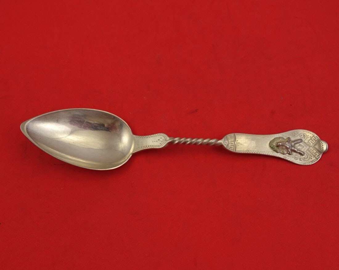 Duhme Saxon Stag Coin Silver Teaspoon Egyptian Motif 6 1/4": Duhme Saxon Stag Coin Silver Teaspoon Egyptian Motif 6 1/4" This exquisite teaspoon from the Saxon Stag pattern by Duhme showcases a stunning Egyptian motif with a twisted handle and a pointed bowl. C
