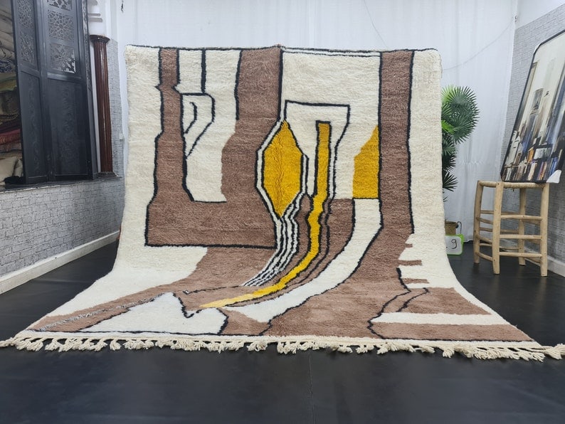Authentic Handmade Moroccan Berber Wool Area Rug 9.84 x 6.56 Feet: Authentic Handmade Moroccan Berber Wool Area Rug 9.84 x 6.56 Feet Experience the beauty of authentic craftsmanship with this Soft Handmade Moroccan Berber Wool Area Rug. This exquisite piece has been 