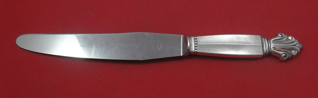 Georg Jensen Acanthus Sterling Silver Dinner Knife 9 7/8": Georg Jensen Acanthus Sterling Silver Dinner Knife 9 7/8" Discover the elegance of the Acanthus dinner knife by Georg Jensen, a stunning addition to any table setting. Crafted from high-quality sterli
