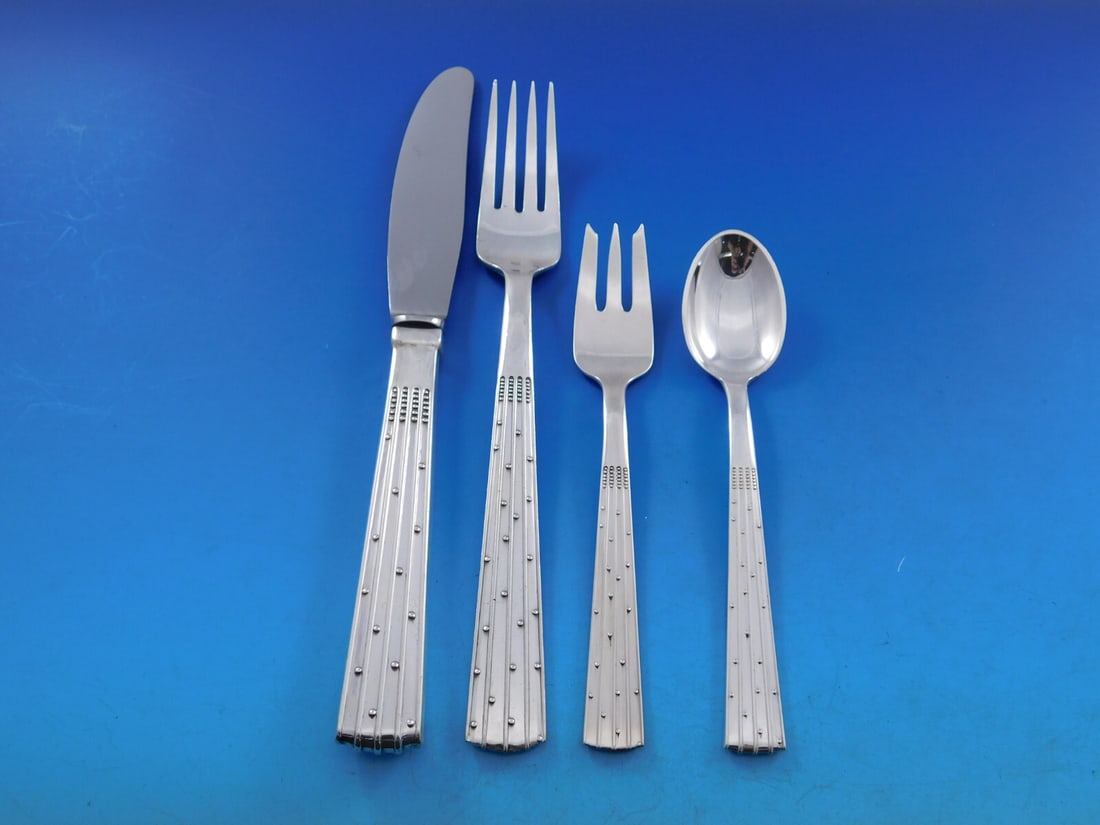 Orla Vagn Mogensen Champagne Sterling Silver 4-Piece Dinner Set: Orla Vagn Mogensen Champagne Sterling Silver 4-Piece Dinner Set Enhance your dining experience with this exquisite 4-piece dinner place setting from the renowned Danish silversmith Orla Vagn Mogensen,