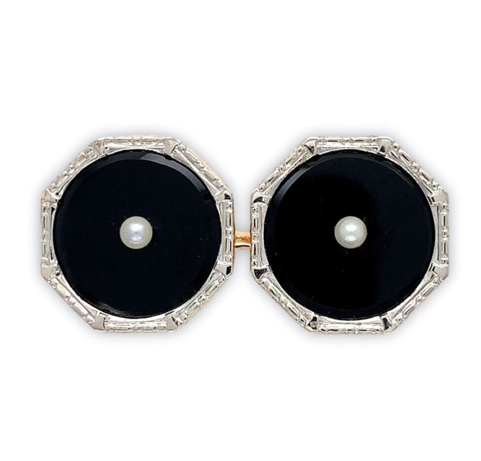 Pair of Platinum Topped 14k Cufflinks With Black Onyx and Pearl Engraved Design: Pair of Platinum Topped 14k Cufflinks With Black Onyx and Pearl Engraved Design This pair of men's cufflinks features black onyx and cultured pearl accents, crafted from platinum-topped 14k yellow gol
