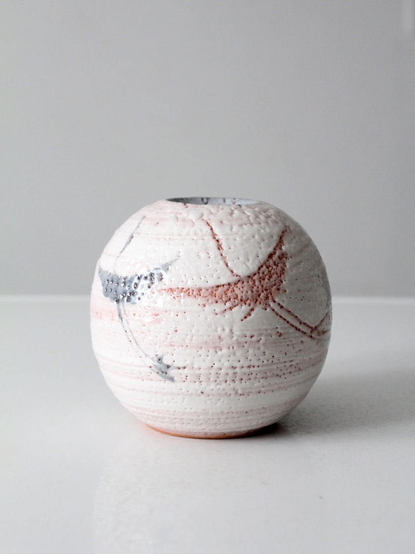 Handmade vintage pottery vase 6 inch cube textured glaze: Handmade vintage pottery vase 6 inch cube textured glaze This vintage handmade studio pottery vase showcases a rounded silhouette and an organic form, highlighted by a softly textured glaze in layered