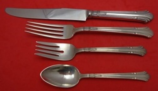 Gorham Shamrock V Sterling Silver 4-Piece Dinner Place Setting: Gorham Shamrock V Sterling Silver 4-Piece Dinner Place Setting Enhance your dining experience with the exquisite Shamrock V pattern by Gorham. This 4-piece sterling silver dinner size place setting in