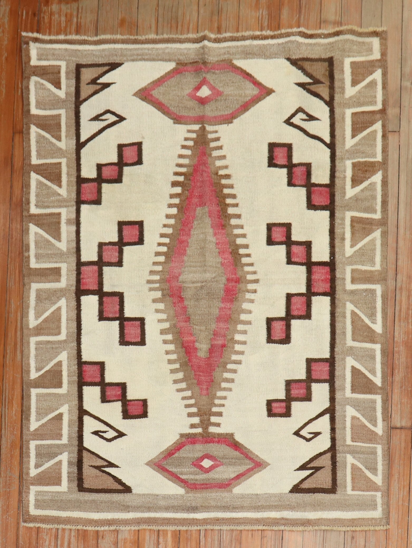 Early 20th Century Navajo Small Square Rug 3' 5" x 4' 5": Early 20th Century Navajo Small Square Rug 3' 5" x 4' 5" Early 20th century Navajo rug with a high decorative design. This pre-owned woven rug features geometric patterning consistent with the provide