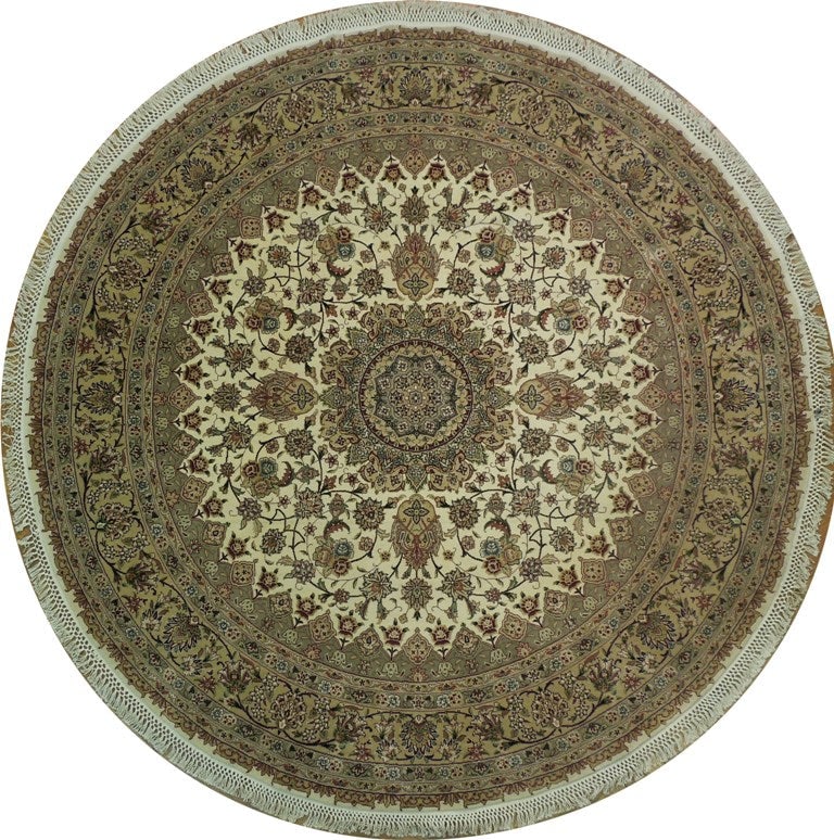 7.1 x 7.3 Round Handmade Fine Weave Wool Silk Rug: 7.1 x 7.3 Round Handmade Fine Weave Wool Silk Rug Free continental US Shipping This 7.1 x 7.3 ft round rug is a finely woven piece crafted from a premium blend of natural wool and silk. Handmade by sk