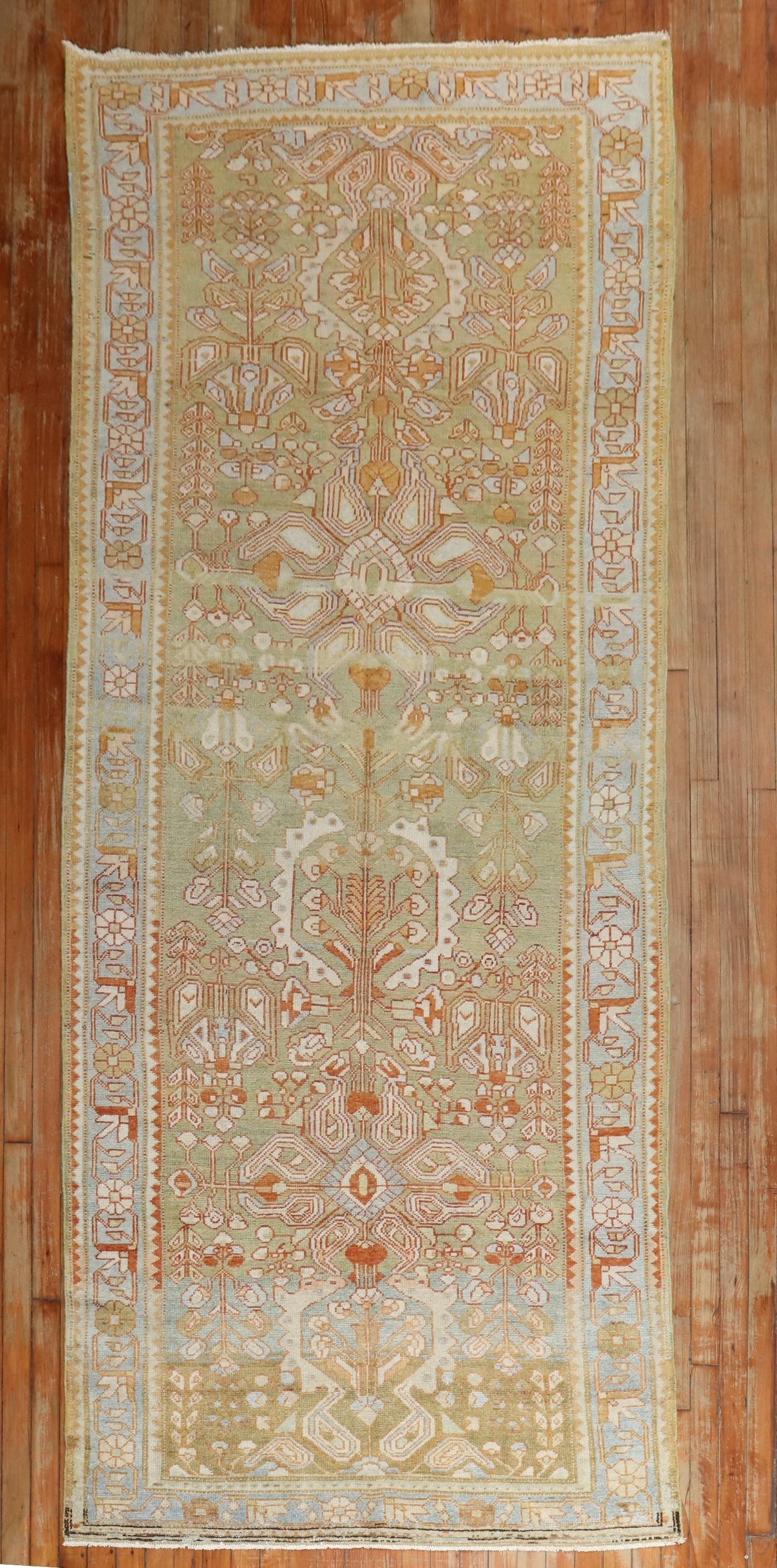 4' x 11' 2" Lilihan Persian runner light green 1920s: 4' x 11' 2" Lilihan Persian runner light green 1920s Pre-owned Persian Lilihan runner from the 1920s featuring an intricate patterned design. The piece is presented in a light green colorway and is ca