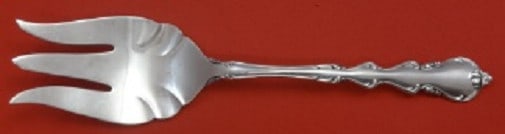 International Sterling Silver Angelique Salad Serving Fork 9" Heirloom: International Sterling Silver Angelique Salad Serving Fork 9" Heirloom Discover the elegance of the Angelique Salad Serving Fork, crafted by International Sterling. This exquisite piece measures 9 inc