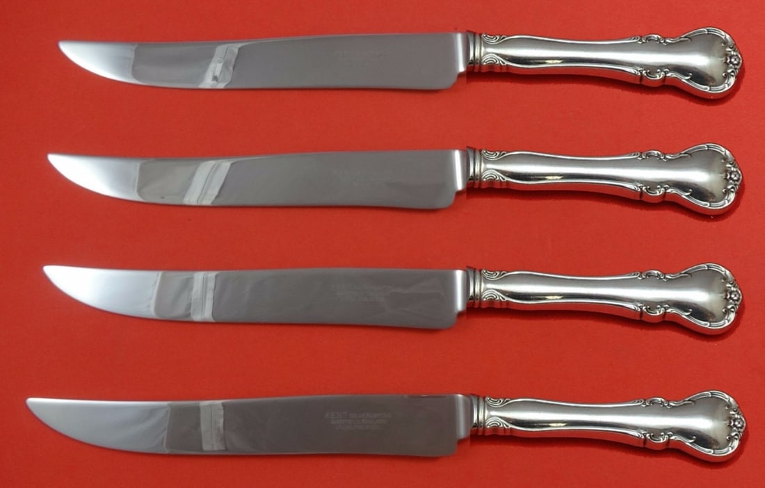 Towle French Provincial Sterling Silver Texas Sized Steak Knife Set 4-Piece: Towle French Provincial Sterling Silver Texas Sized Steak Knife Set 4-Piece Experience the elegance of dining with this French Provincial by Towle Sterling Silver Steak Knife Set. Crafted from sterlin