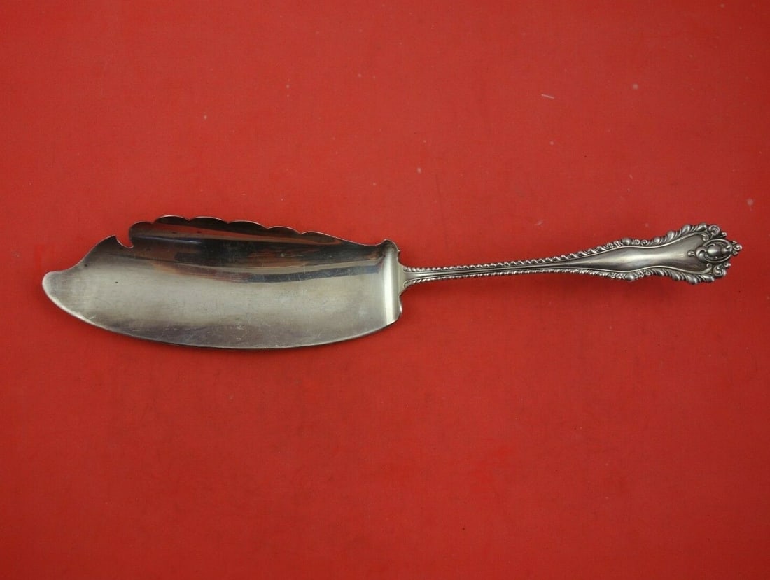 Dominick & Haff Mazarin Sterling Silver Fish Server 11.5": Dominick & Haff Mazarin Sterling Silver Fish Server 11.5" Presenting a stunning fish server from the Mazarin pattern by Dominick & Haff, crafted from high-quality sterling silver. This elegant serving