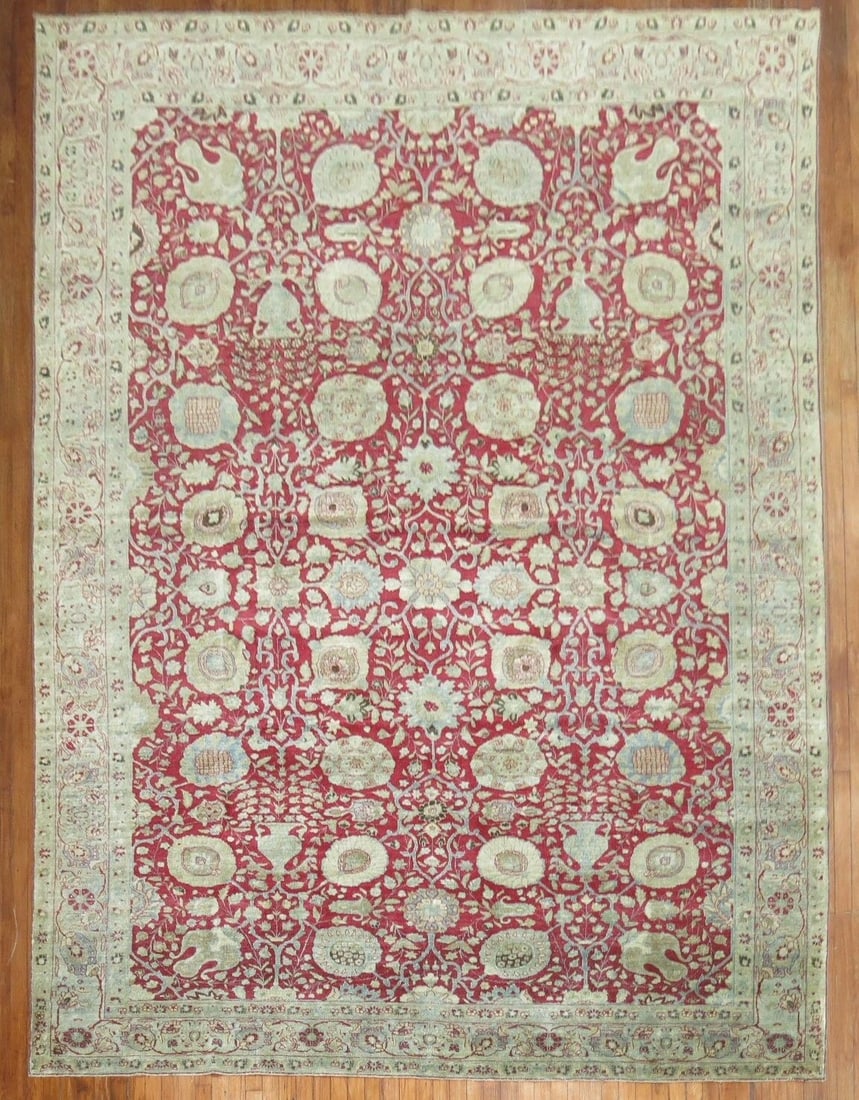 9' 2" x 13' 2" Early 20th Century Persian Tabriz Room Rug: 9' 2" x 13' 2" Early 20th Century Persian Tabriz Room Rug Early 20th century Persian Tabriz room rug in a red colorway. This pre-owned rug features the classic Tabriz form and design style. Specificat