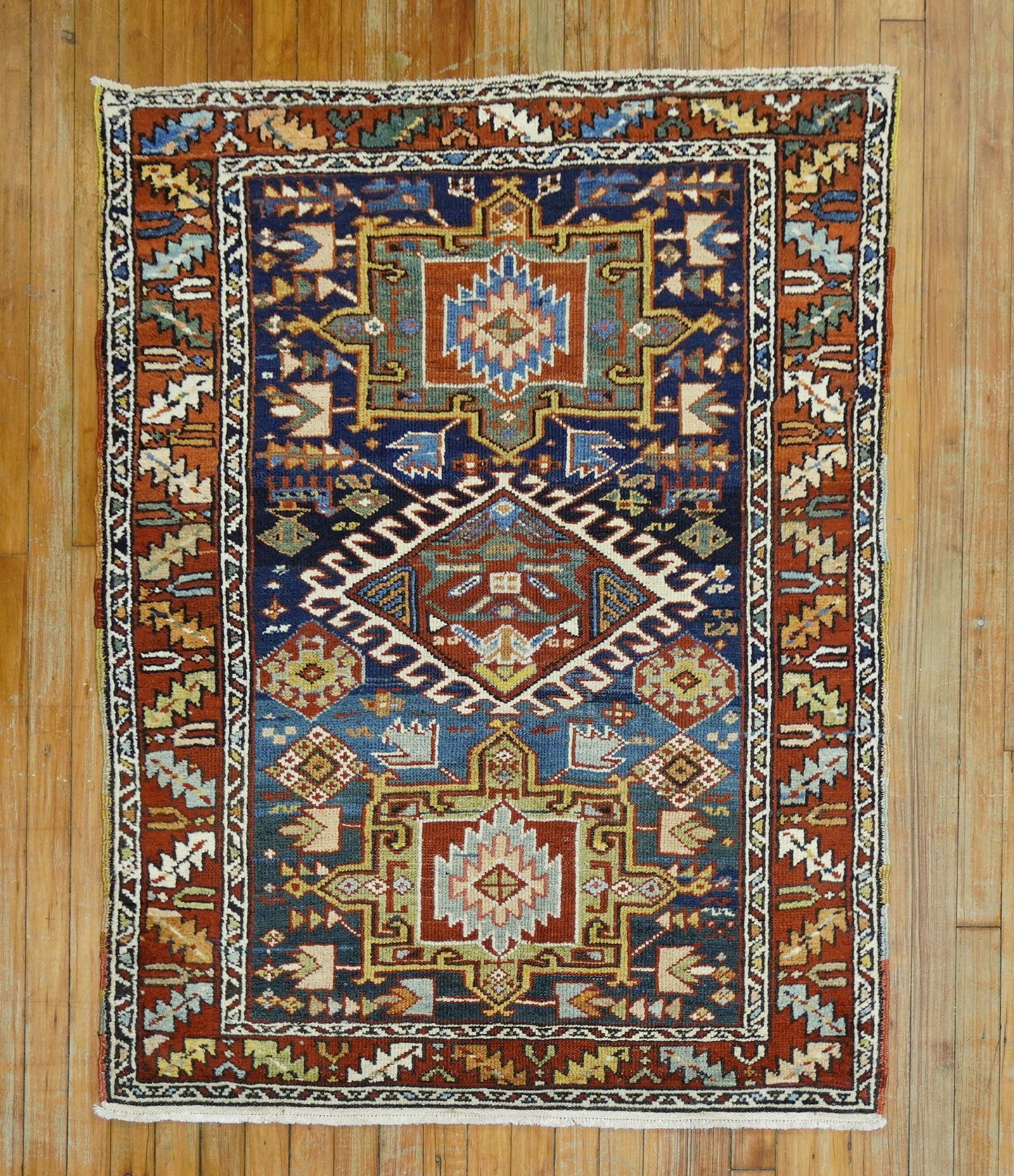 3' 4" x 4' 5" Persian Heriz Karadja Scatter Rug: 3' 4" x 4' 5" Persian Heriz Karadja Scatter Rug 20th century Persian Heriz Karadja scatter rug with a navy field and geometric design. Classified as a Serapi/Heriz type, this pre-owned rug is a small 