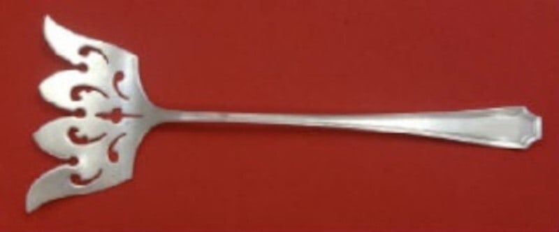 Durgin-Gorham Fairfax Sterling Silver Pierced Bacon Fork 7 3/4": Durgin-Gorham Fairfax Sterling Silver Pierced Bacon Fork 7 3/4" This elegant Fairfax by Durgin-Gorham sterling silver bacon fork features a pierced design and measures 7 3/4 inches in length. Crafted 