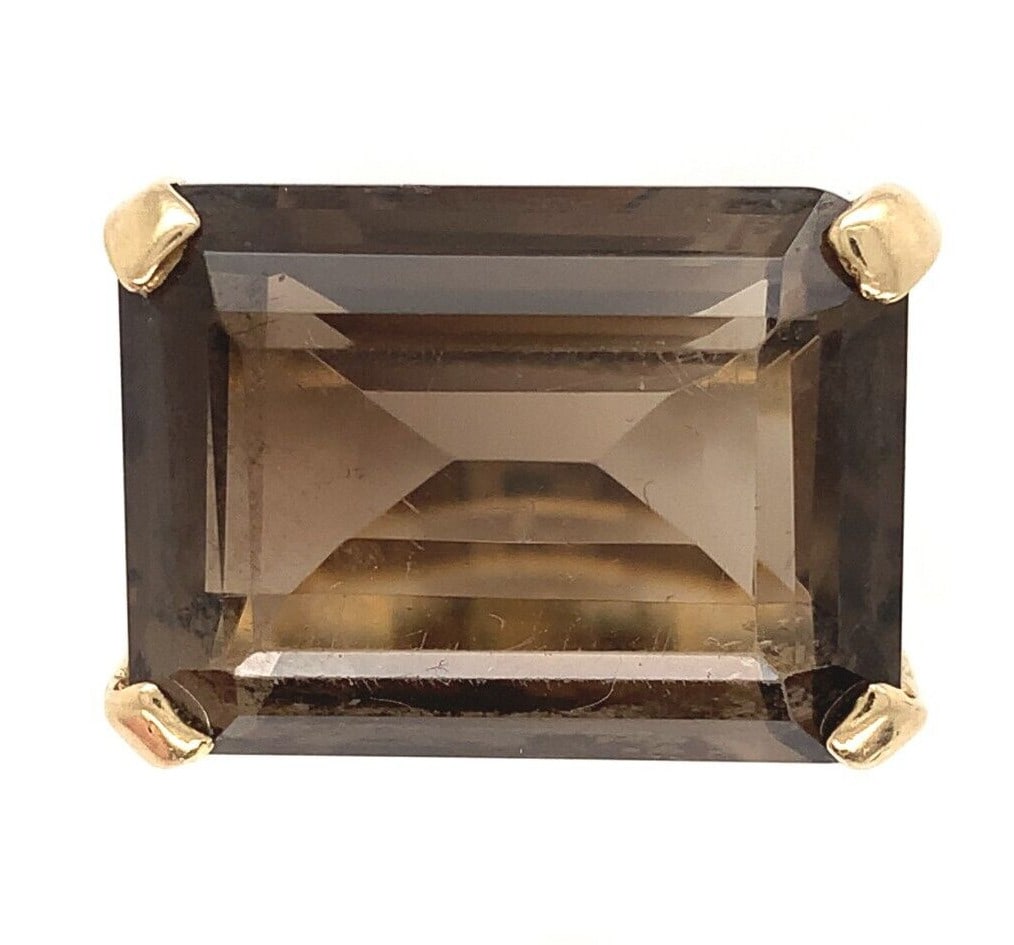 14k Yellow Gold Mid Century Modern Smoky Quartz Ring Emerald Cut: 14k Yellow Gold Mid Century Modern Smoky Quartz Ring Emerald Cut This exquisite 14k yellow gold ring showcases a genuine natural smoky quartz in a stunning emerald cut, measuring approximately 20mm x 