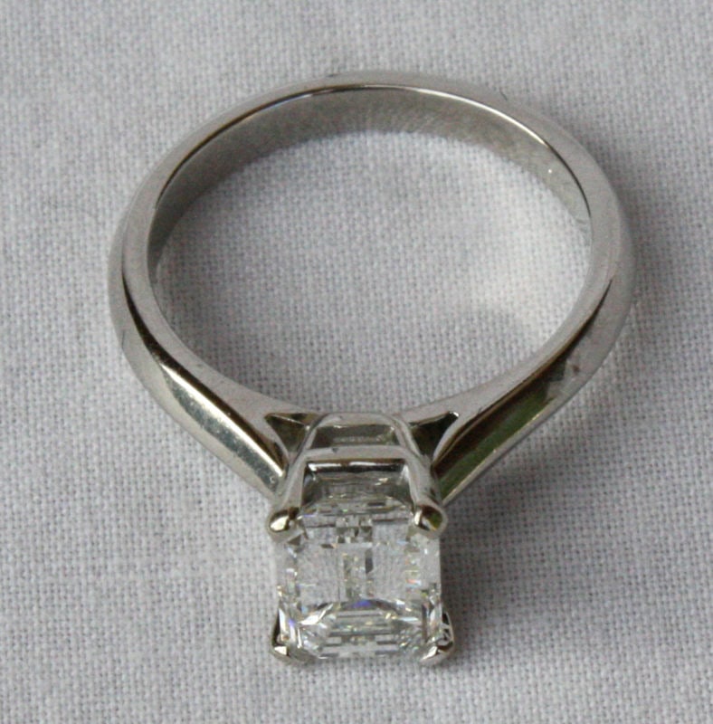 1.51 CT EGL Certified Emerald Cut Platinum Diamond Ring Size 5.25: 1.51 CT EGL Certified Emerald Cut Platinum Diamond Ring Size 5.25 Discover the elegance of this stunning emerald cut diamond ring, featuring a 1.51 ct diamond with an EGL Certificate. The diamond