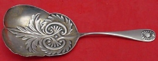 Durgin Shell Sterling Silver 5 1/2 Almond Scoop: Durgin Shell Sterling Silver 5 1/2 Almond Scoop Sterling silver almond scoop in the Shell pattern by Durgin. This pre-owned piece is not monogrammed and is in excellent condition. Specifications Item 
