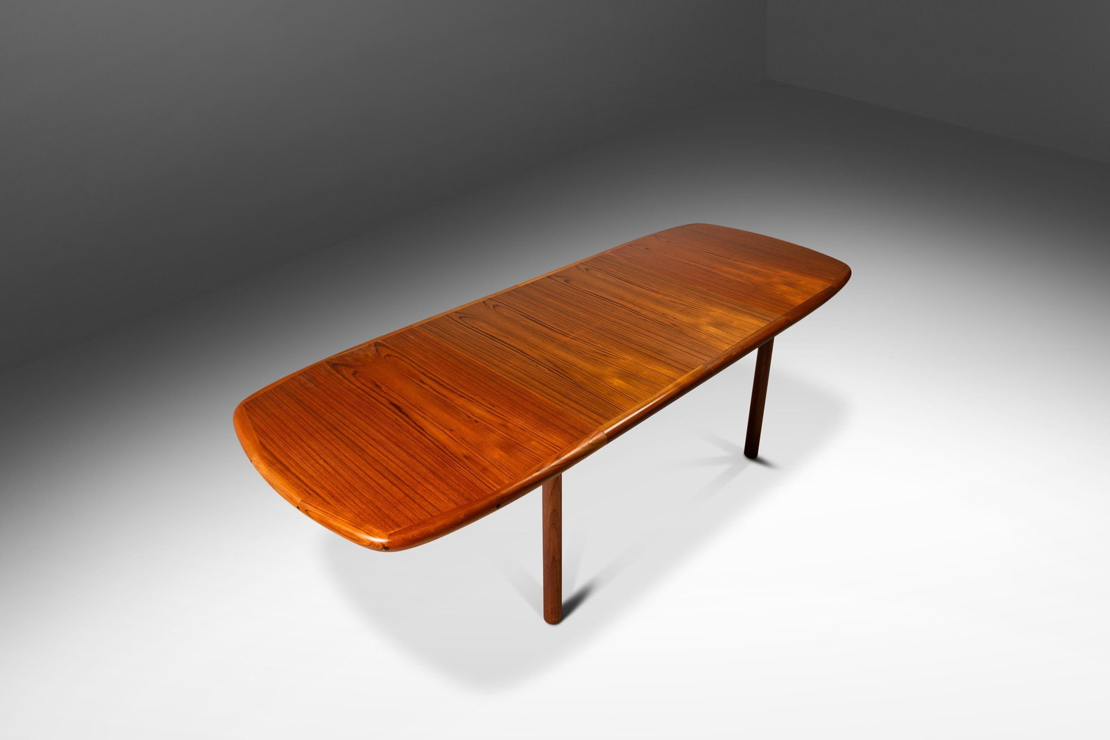 D-SCAN Danish Mid-Century Modern Teak Extension Dining Table with Double Butterfly Leaf: D-SCAN Danish Mid-Century Modern Teak Extension Dining Table with Double Butterfly Leaf Experience the elegance of this Danish Mid-Century Modern Extension Dining Table, crafted from a mix of solid an