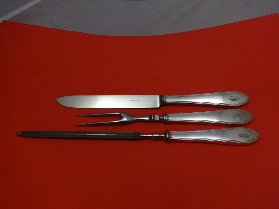 Tiffany & Co. Reeded Edge Sterling Silver 3pc Roast Carving Set: Tiffany & Co. Reeded Edge Sterling Silver 3pc Roast Carving Set This exquisite three-piece roast carving set by Tiffany & Co. features a stunning reeded edge design. Crafted from high-quality sterling