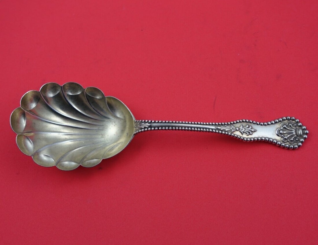 Dominick & Haff Charles II Sterling Silver Preserve Spoon Gold Wash 7 3/4": Dominick & Haff Charles II Sterling Silver Preserve Spoon Gold Wash 7 3/4" This exquisite serving spoon is a stunning example of the Charles II pattern by Dominick & Haff, crafted from high-quality