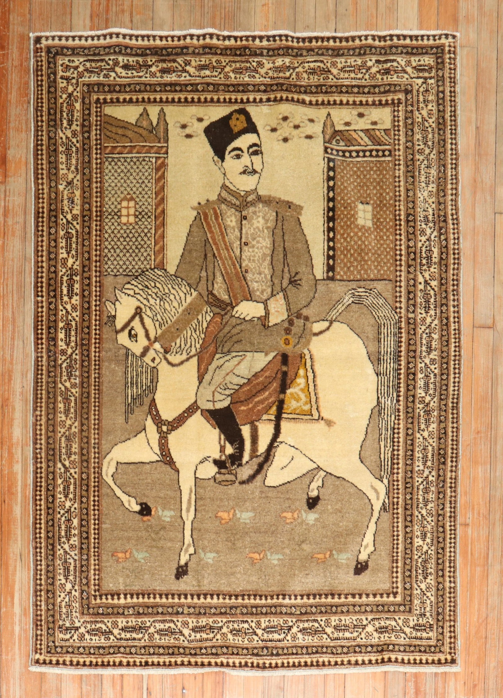 4' x 5' 8" Persian Tabriz Pictorial Rug with Horse Rider: 4' x 5' 8" Persian Tabriz Pictorial Rug with Horse Rider Early 20th century Persian Tabriz pictorial accent rug featuring a scene of a Persian man riding a horse. Pre-owned. Specifications Origin: Per