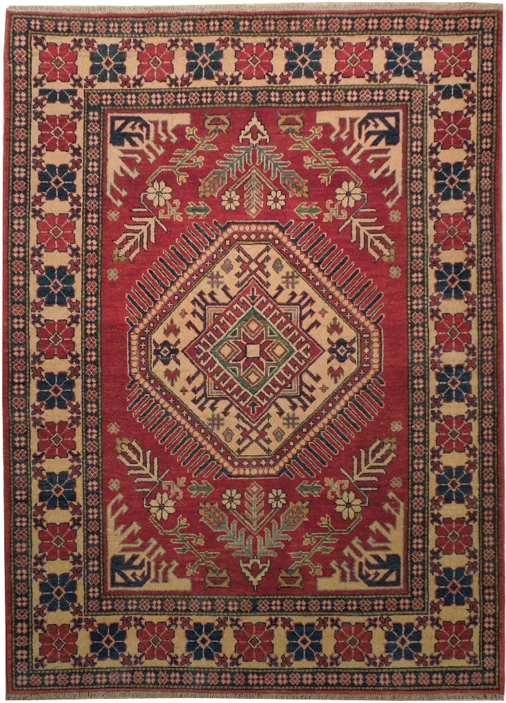 4.9 x 6.6 Hand-Knotted Afghan Kazak Wool Rug: 4.9 x 6.6 Hand-Knotted Afghan Kazak Wool Rug Free continental US Shipping This hand-knotted Afghan Kazak rug measures 4.9 x 6.6 and features a bold geometric design with repeating medallion patterns a