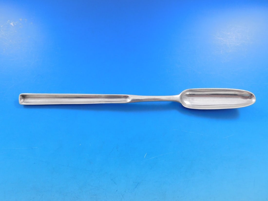 Georgian Sterling Silver Marrow Scoop London 1791 by Charles Houghan 9.25": Georgian Sterling Silver Marrow Scoop London 1791 by Charles Houghan 9.25" This exquisite Georgian Marrow Scoop, crafted from sterling silver, showcases the artistry of London in 1791 by renowned make