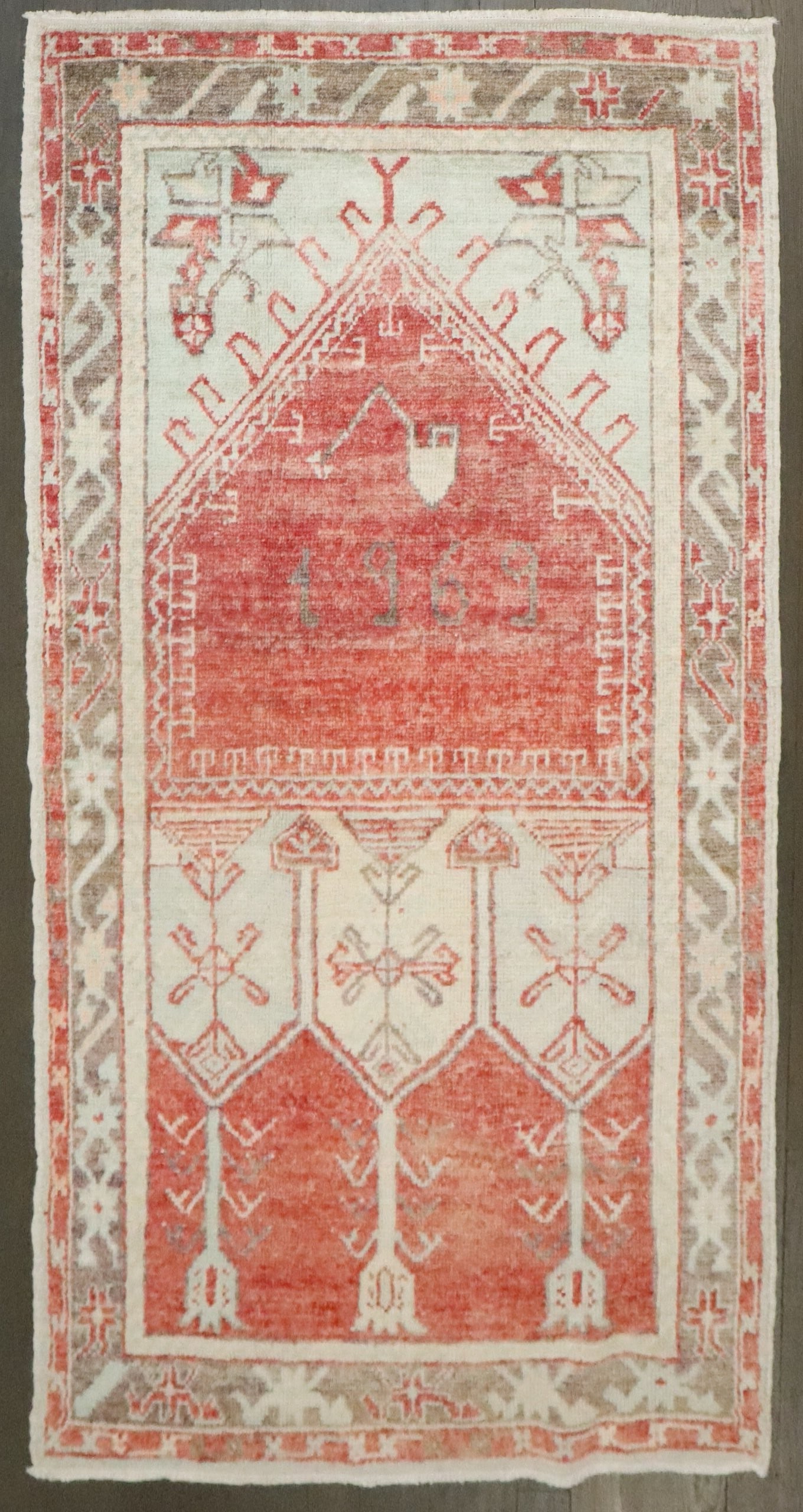 2' 8" x 5' Anatolian Turkish Prayer Rug dated 1969: 2' 8" x 5' Anatolian Turkish Prayer Rug dated 1969 Turkish Anatolian prayer rug featuring a prayer niche design and dated 1969. This pre-owned small rug retains the original listing's stated character