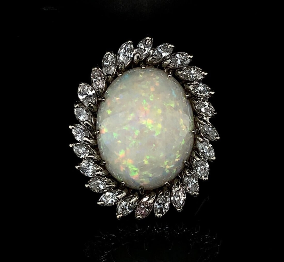 Vintage Platinum Opal Diamond Ring Pendant 18ct Opal 2.50ct Diamonds: Vintage Platinum Opal Diamond Ring Pendant 18ct Opal 2.50ct Diamonds This exquisite ring pendant features a stunning genuine natural opal and is adorned with 24 marquise-cut diamonds. The centerpiece 