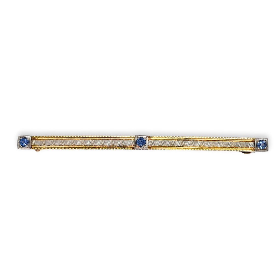14k Gold Edwardian Sapphire Bar Pin with Gillouche Design: 14k Gold Edwardian Sapphire Bar Pin with Gillouche Design This exquisite antique bar pin features genuine Montana sapphires set in a stunning 14k gold design. The piece is crafted in a combination of 