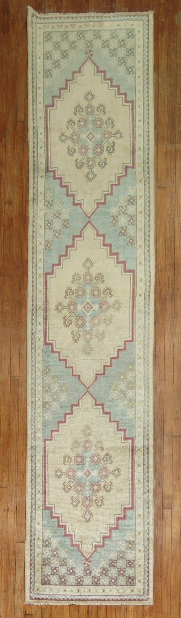 2' 8" x 12' Mid 20th Century Turkish Anatolian Rug Runner: 2' 8" x 12' Mid 20th Century Turkish Anatolian Rug Runner Vintage Turkish Anatolian runner from the mid-20th century. This pre-owned rug is categorized as an Anatolian runner. Specifications Type: Ana