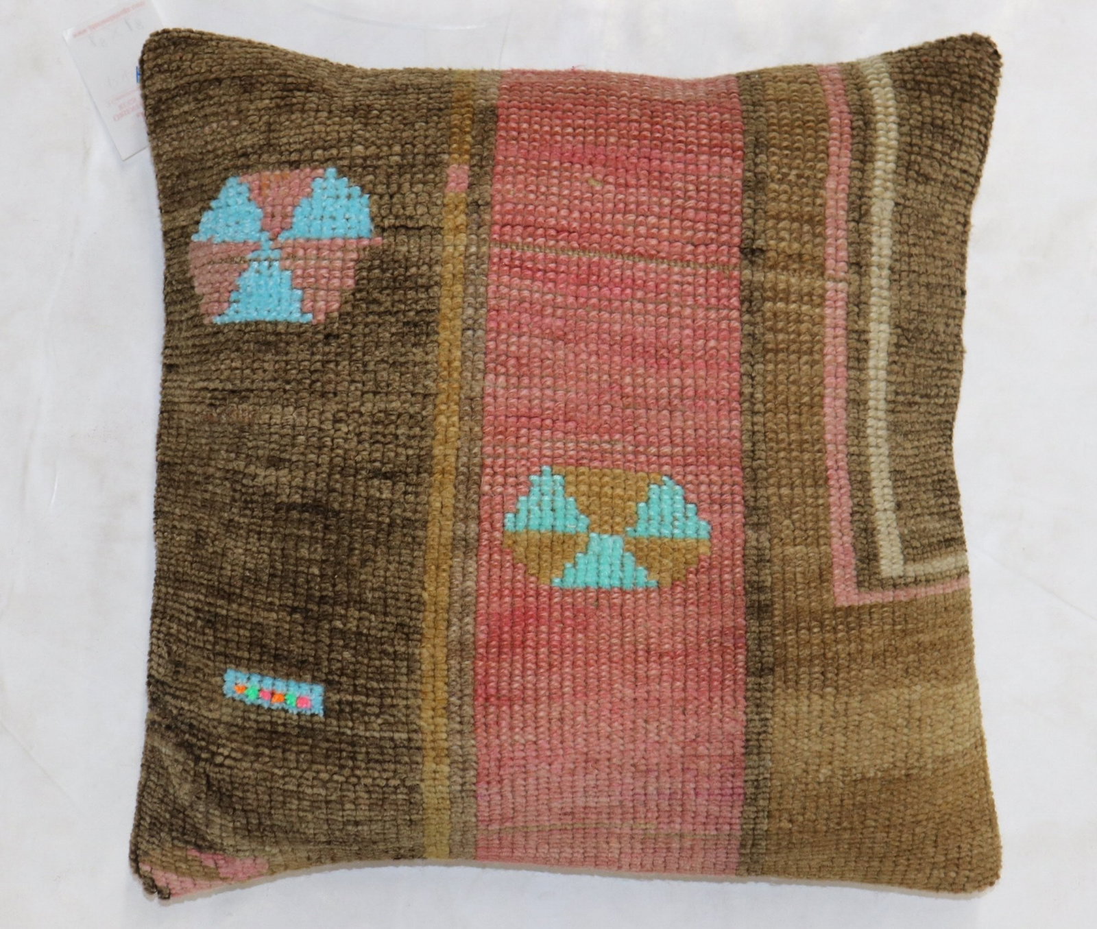 1' 8" x 1' 8" Anatolian Turkish Rug Pillow: 1' 8" x 1' 8" Anatolian Turkish Rug Pillow Decorative pillow made from a square Turkish Anatolian rug. This pre-owned piece features a woven design with geometric patterning. Specifications Type: Anat