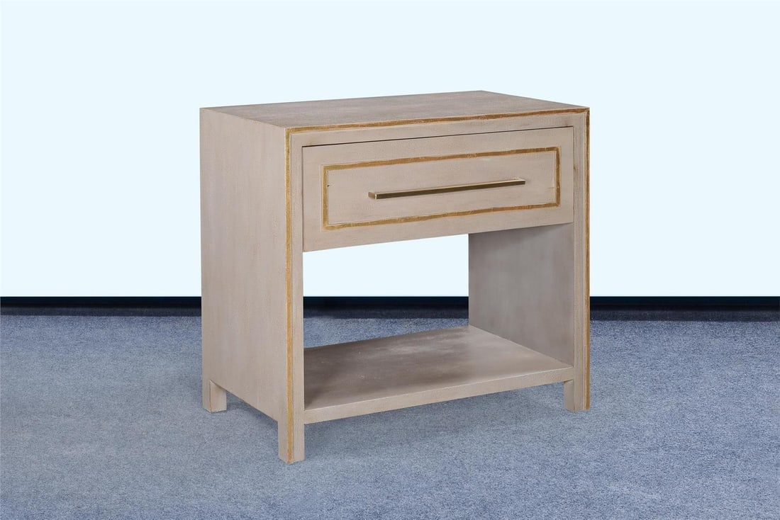 Wilmont Nightstand with Pewter Finish and Gold Accents: Wilmont Nightstand with Pewter Finish and Gold Accents Introducing the Chic Wilmont Nightstand, a stylish addition to your bedroom decor. This nightstand features a sleek Pewter finish complemented by