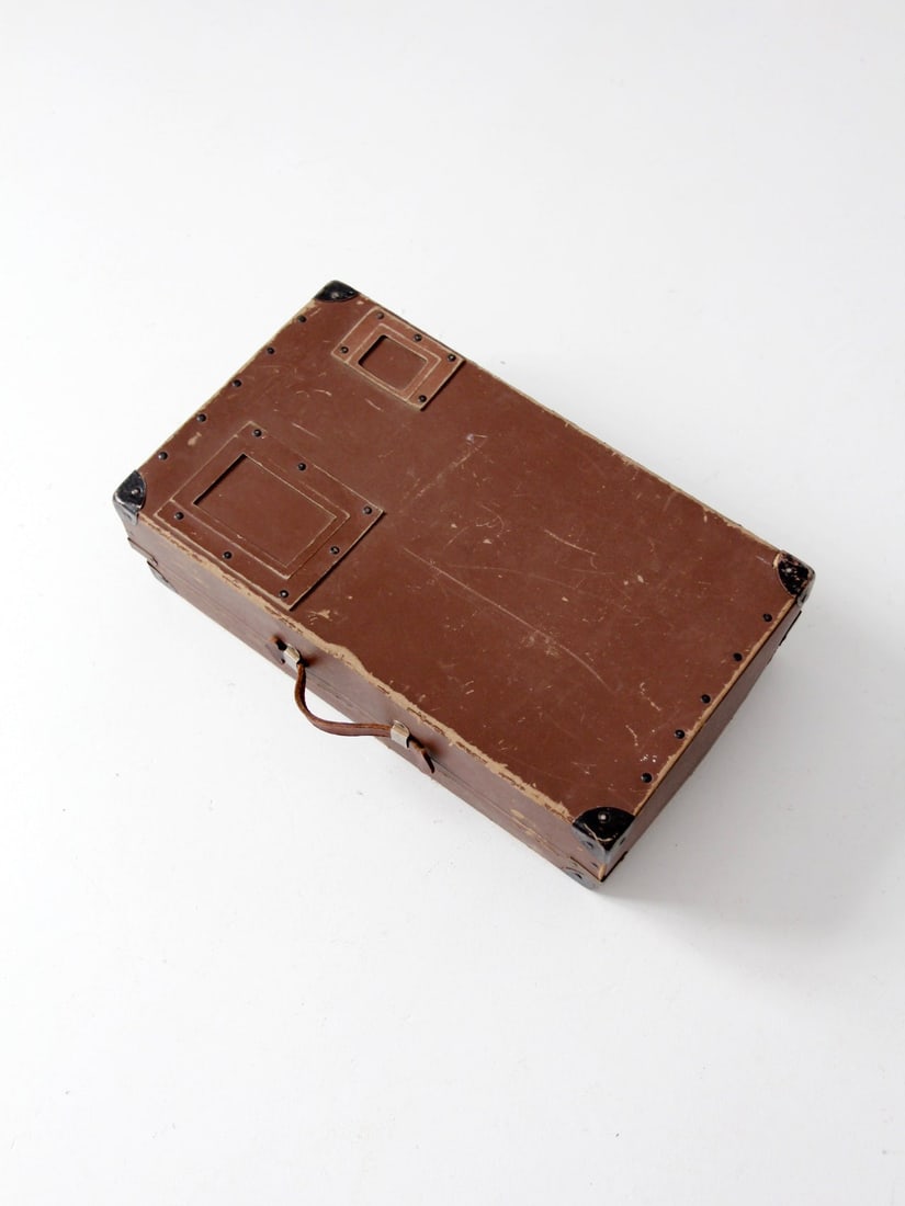 Vintage Fiberboard Mailing Case Brown with Leather Handle: Vintage Fiberboard Mailing Case Brown with Leather Handle Vintage fiberboard mailing box with a warm brown exterior, leather handle, metal corner protectors, and inset label holders. The simple utilit