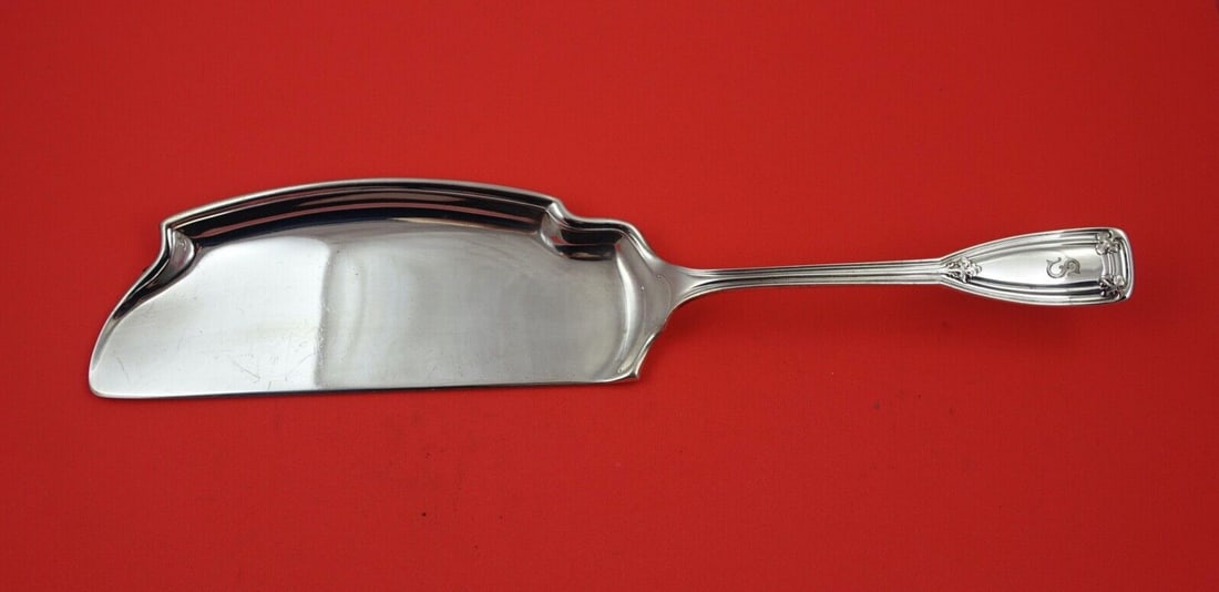 Tiffany & Co. Saint Dunstan Sterling Silver Crumber 12 7/8 inches: Tiffany & Co. Saint Dunstan Sterling Silver Crumber 12 7/8 inches This exquisite Sterling Silver Crumber, measuring 12 7/8 inches, features the elegant Saint Dunstan pattern by Tiffany & Co. Crafted b