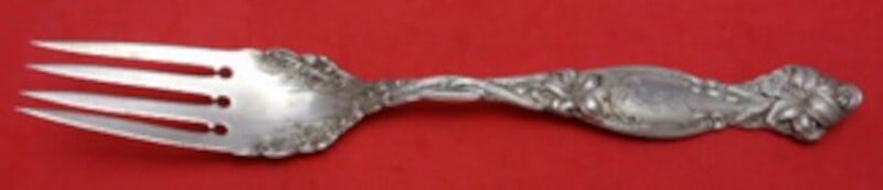 International Silver Frontenac Sterling Silver Fish Fork 7 5/8": International Silver Frontenac Sterling Silver Fish Fork 7 5/8" This exquisite fish fork is part of the Frontenac pattern by International Silver, crafted from high-quality sterling silver. Measuring 