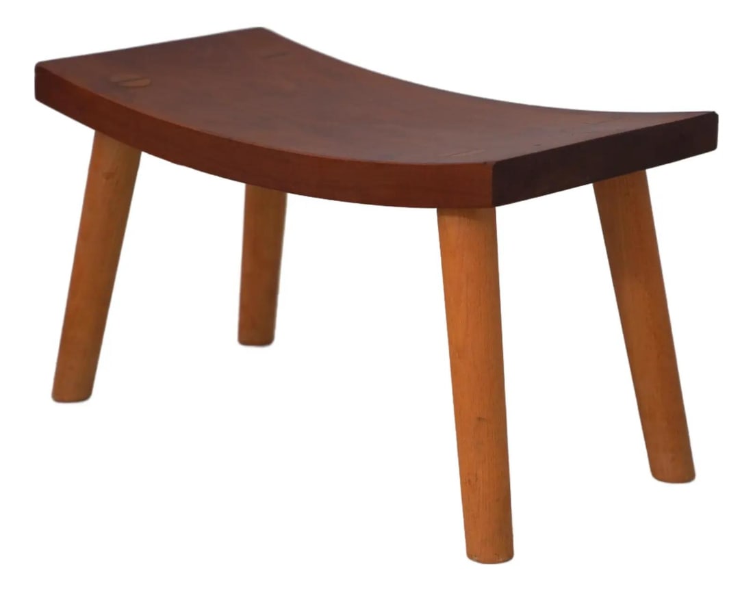 Thomas Moser crescent cherry footstool 15w x 7.5d x 9h: Thomas Moser crescent cherry footstool 15w x 7.5d x 9h Studio-crafted curved footstool in cherry wood with a traditional crescent-form design. Made circa 1999, this piece features high-quality constru