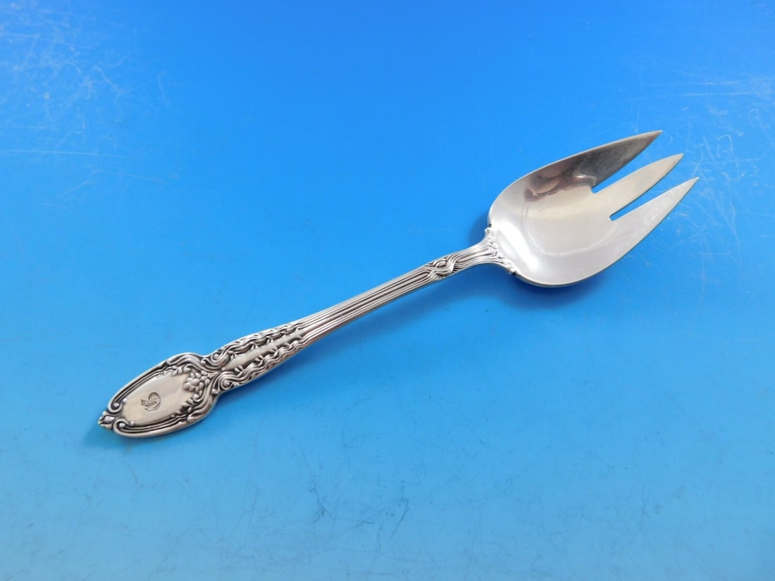 Tiffany & Co Broom Corn Sterling Silver 3-Tine Fork Monogrammed 5 3/8": Tiffany & Co Broom Corn Sterling Silver 3-Tine Fork Monogrammed 5 3/8" This exquisite 3-tine fork from Tiffany & Co. features the elegant Broom Corn pattern, crafted from high-quality sterling silver.