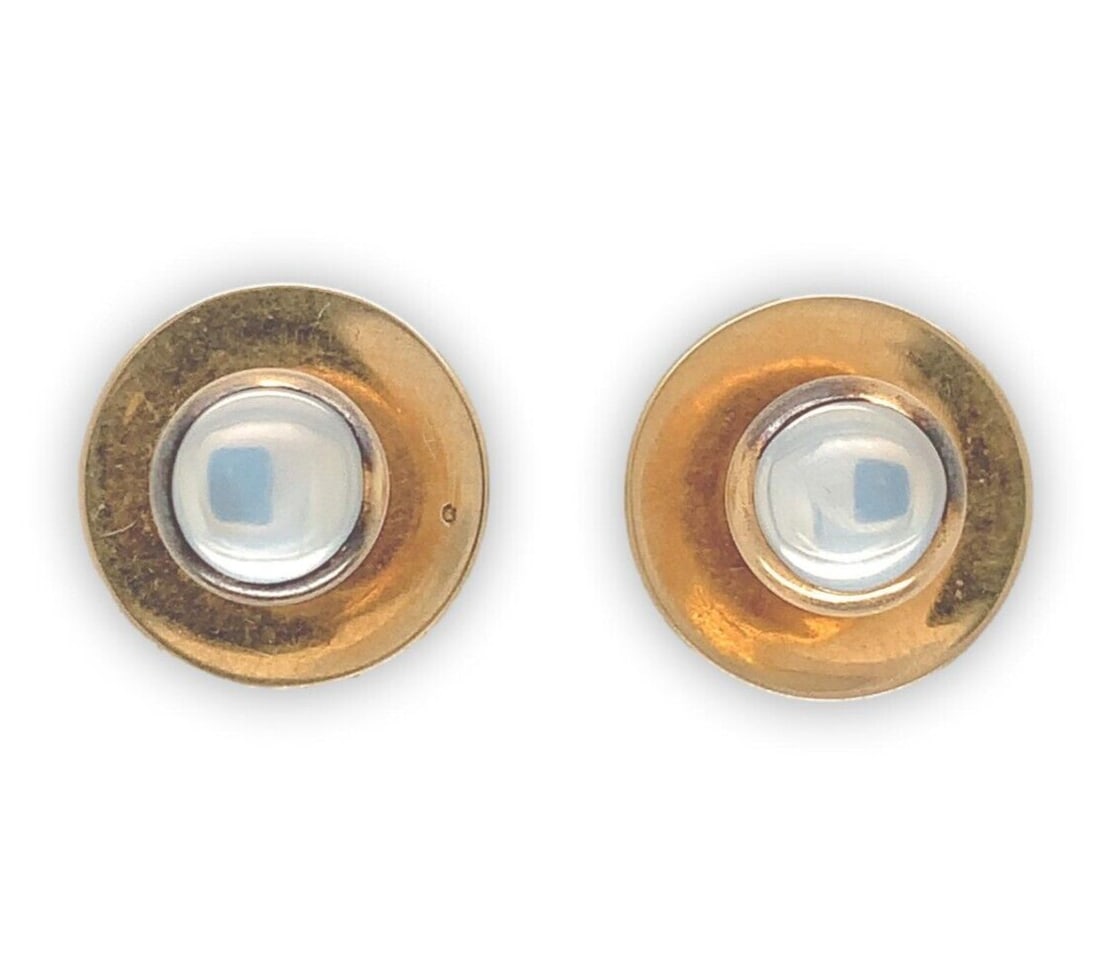 Pair of 14k Yellow Gold Shirt Studs with Genuine Moonstones Vintage 1930s-40s: Pair of 14k Yellow Gold Shirt Studs with Genuine Moonstones Vintage 1930s-40s This pair of 14k yellow gold shirt studs features genuine natural moonstones displaying blue and white adularescence. The 
