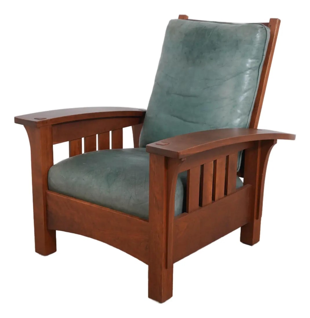 Stickley reclining Morris chair in cherry with tooled leather: Stickley reclining Morris chair in cherry with tooled leather Stickley Mission Morris chair with cherry wood construction and a tooled leather seat and back. This Arts & Crafts design features a recli