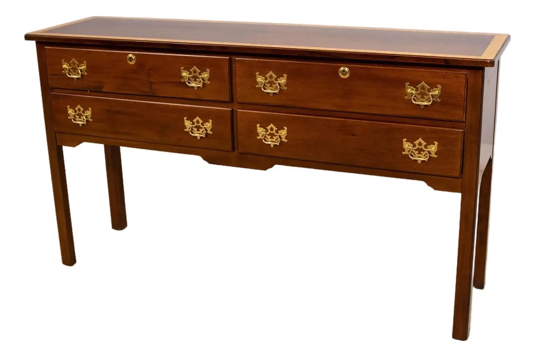 Chippendale Mahogany Four Drawer Server with Satinwood Crossbanding: Chippendale Mahogany Four Drawer Server with Satinwood Crossbanding This 1990s Madison Square server commode features a traditional Chippendale style with high-quality construction. It is crafted from