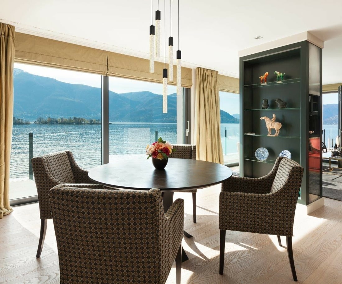 Weston 5-Light Black Pendant Chandelier with Seeded Glass: Weston 5-Light Black Pendant Chandelier with Seeded Glass Modern 5-light chandelier with a black finish and clear seeded crystal bar glass details. It is hardwired, indoor-rated, and height adjustable